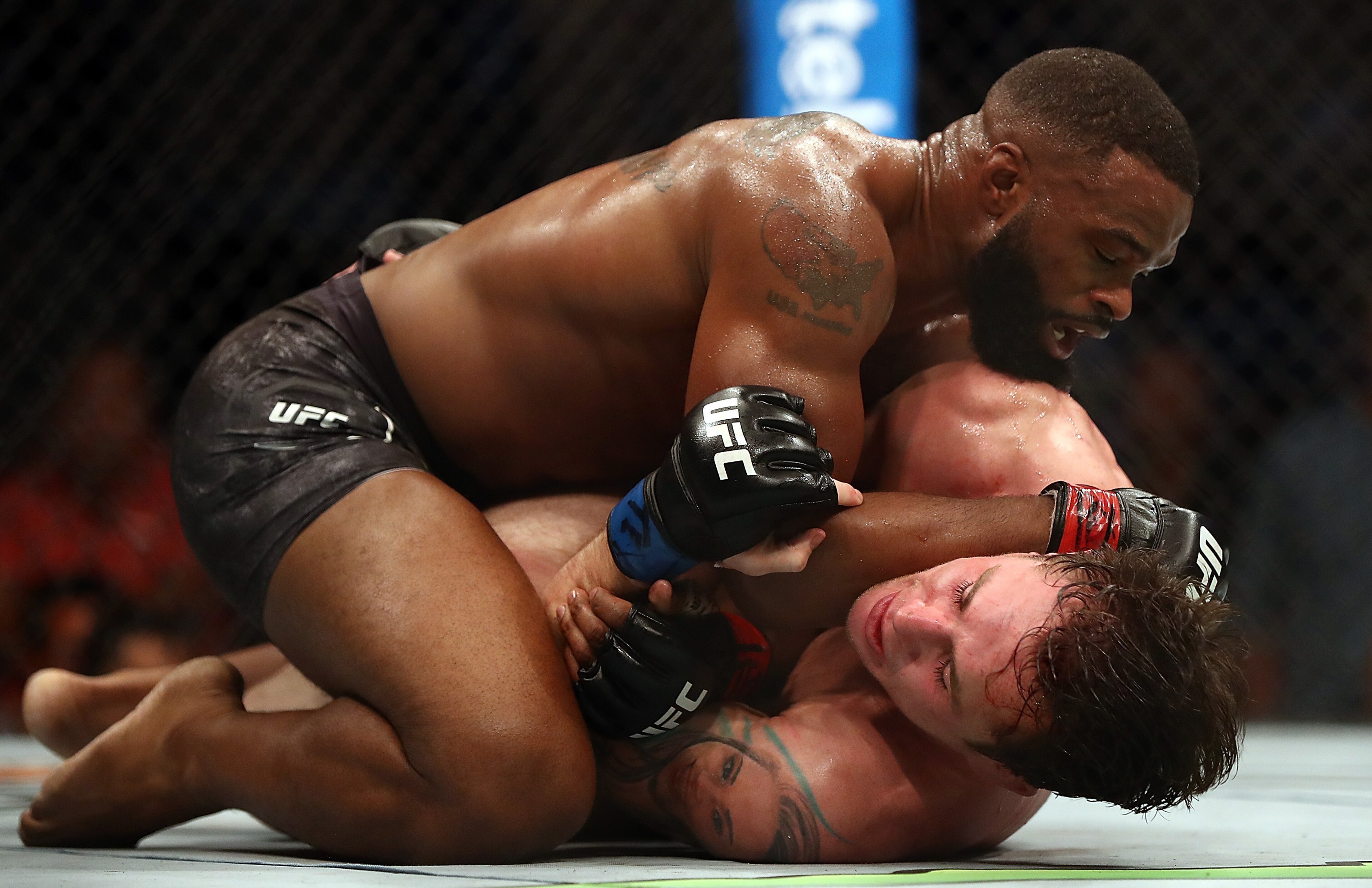Tyron Woodley (top) and Darren Till