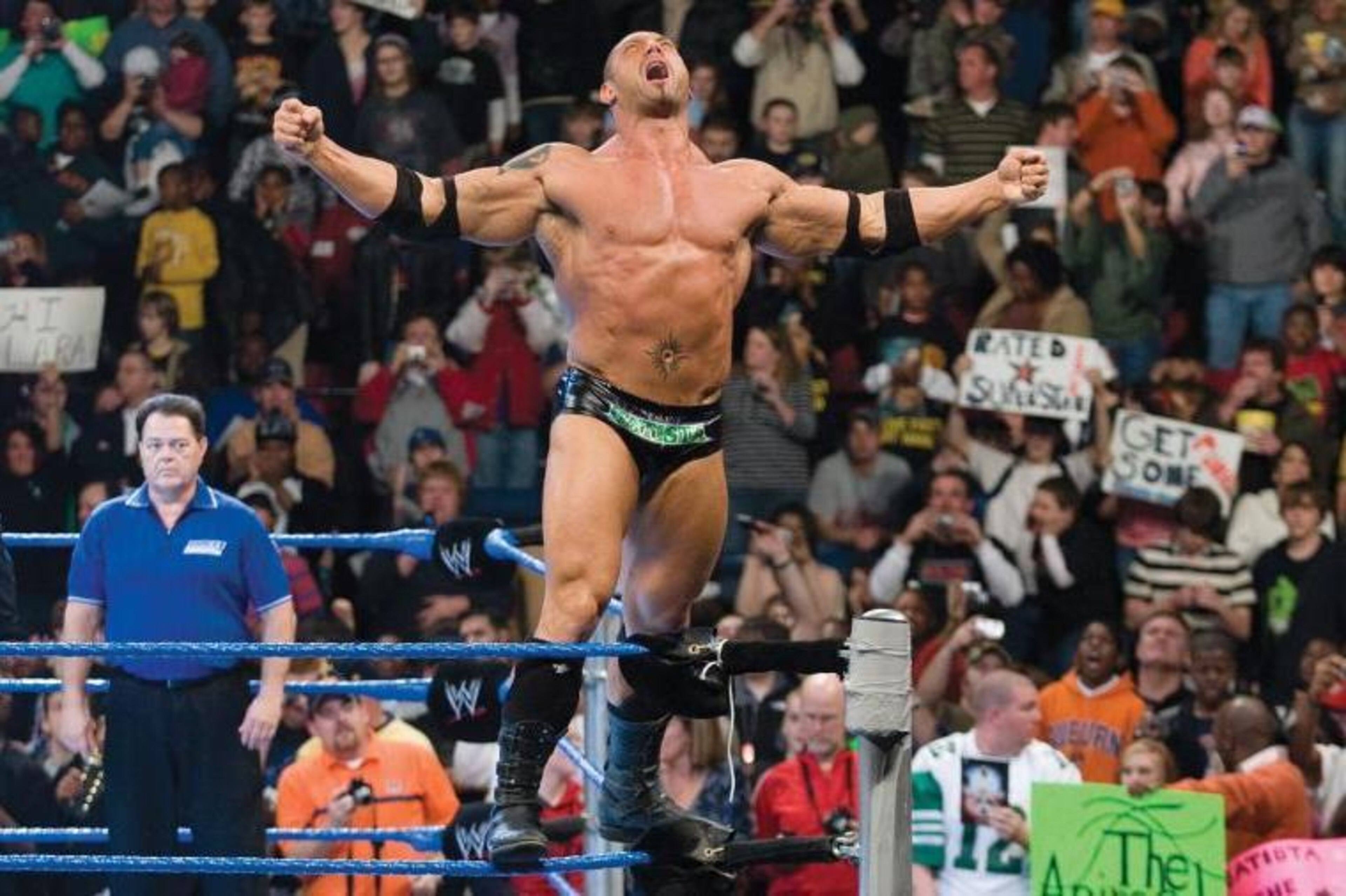 Batista posing for the WWE Universe.