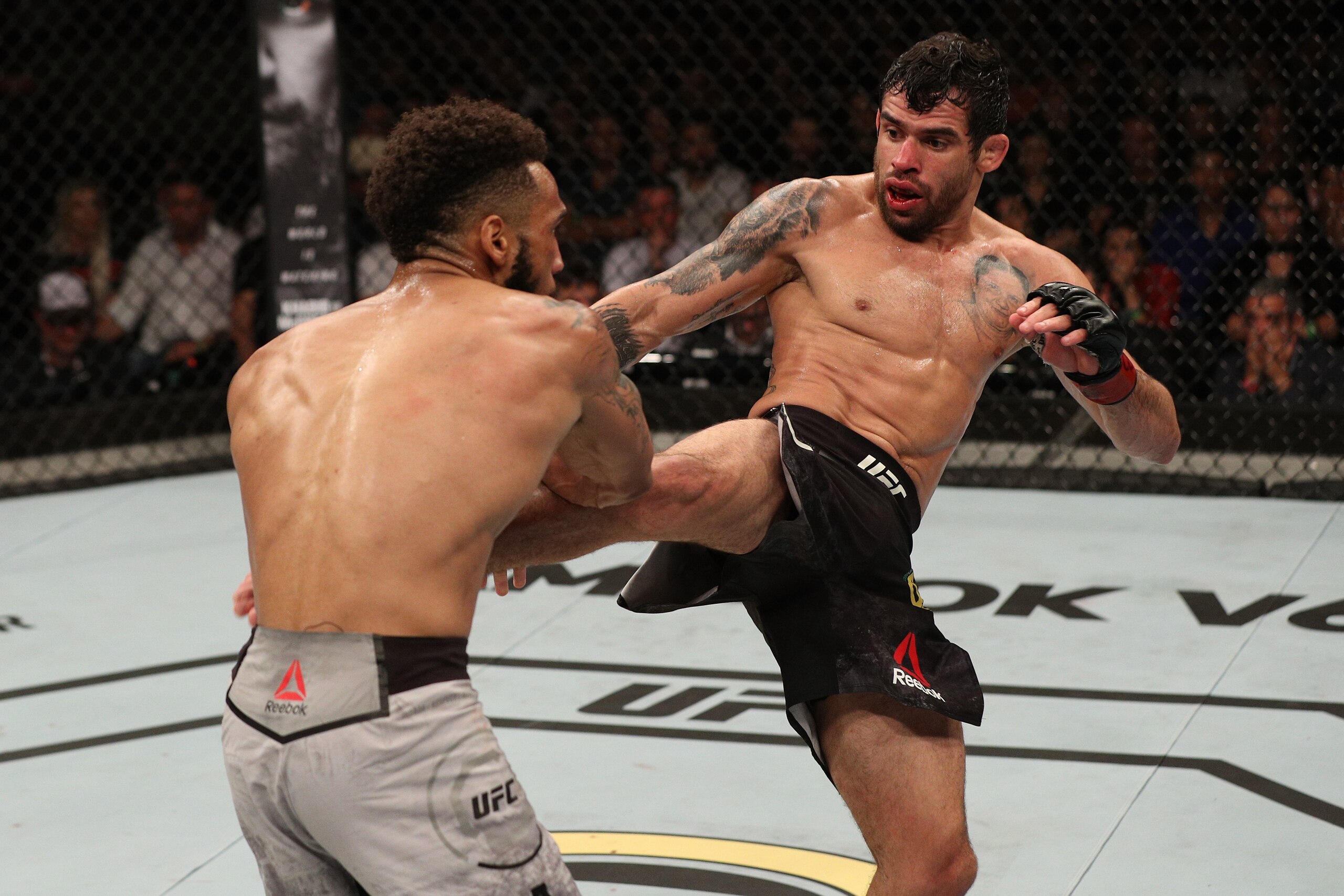 Renan Barao (right) and Andre Ewell Renan Barao (right) and Andre Ewell