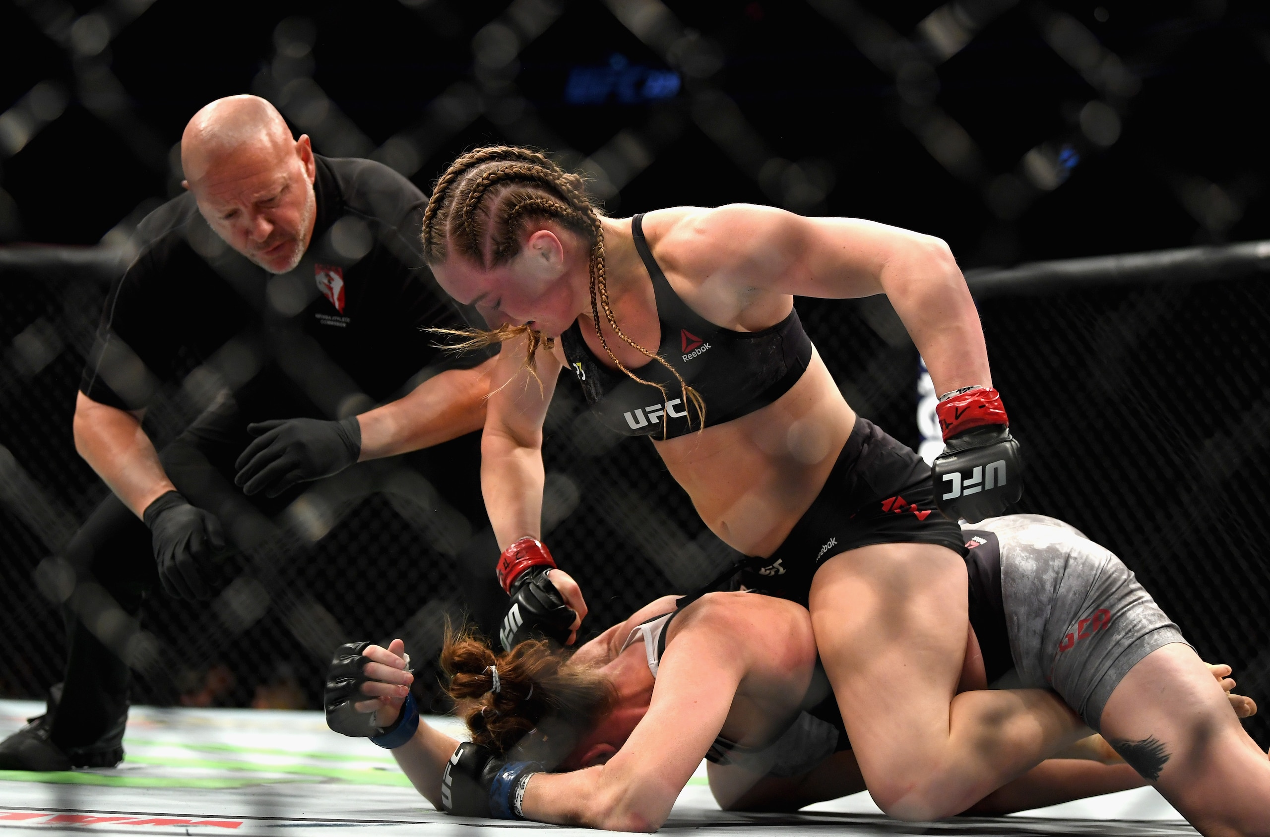 Aspen Ladd (top) finishes Tonya Evinger
