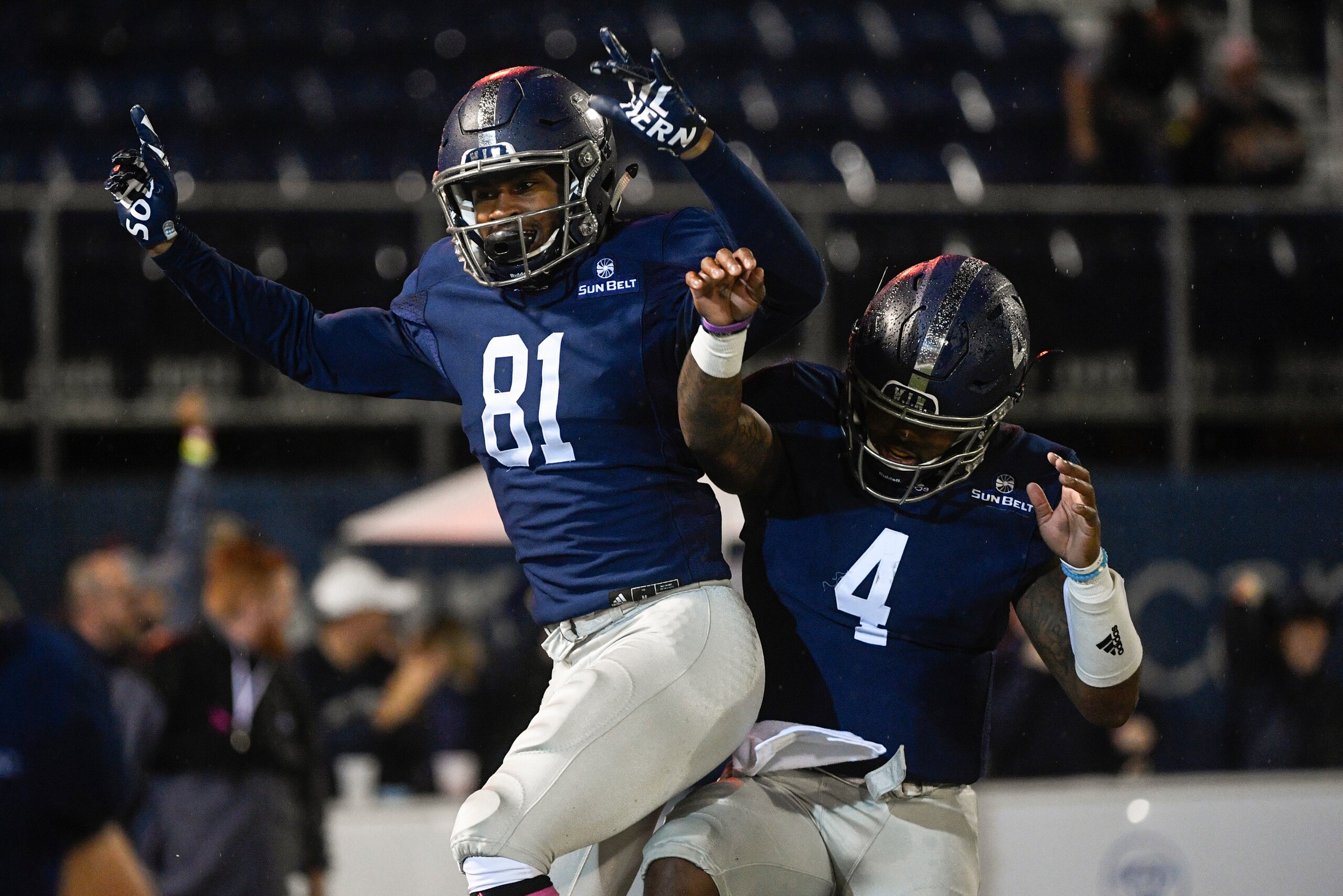 Georgia Southern's Shai Werts (4) and Darion Anderson (81)