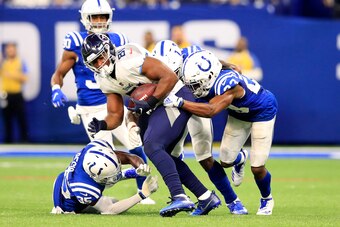 Tight end Jonnu Smith secures a catch against the Indianapolis Colts defense
