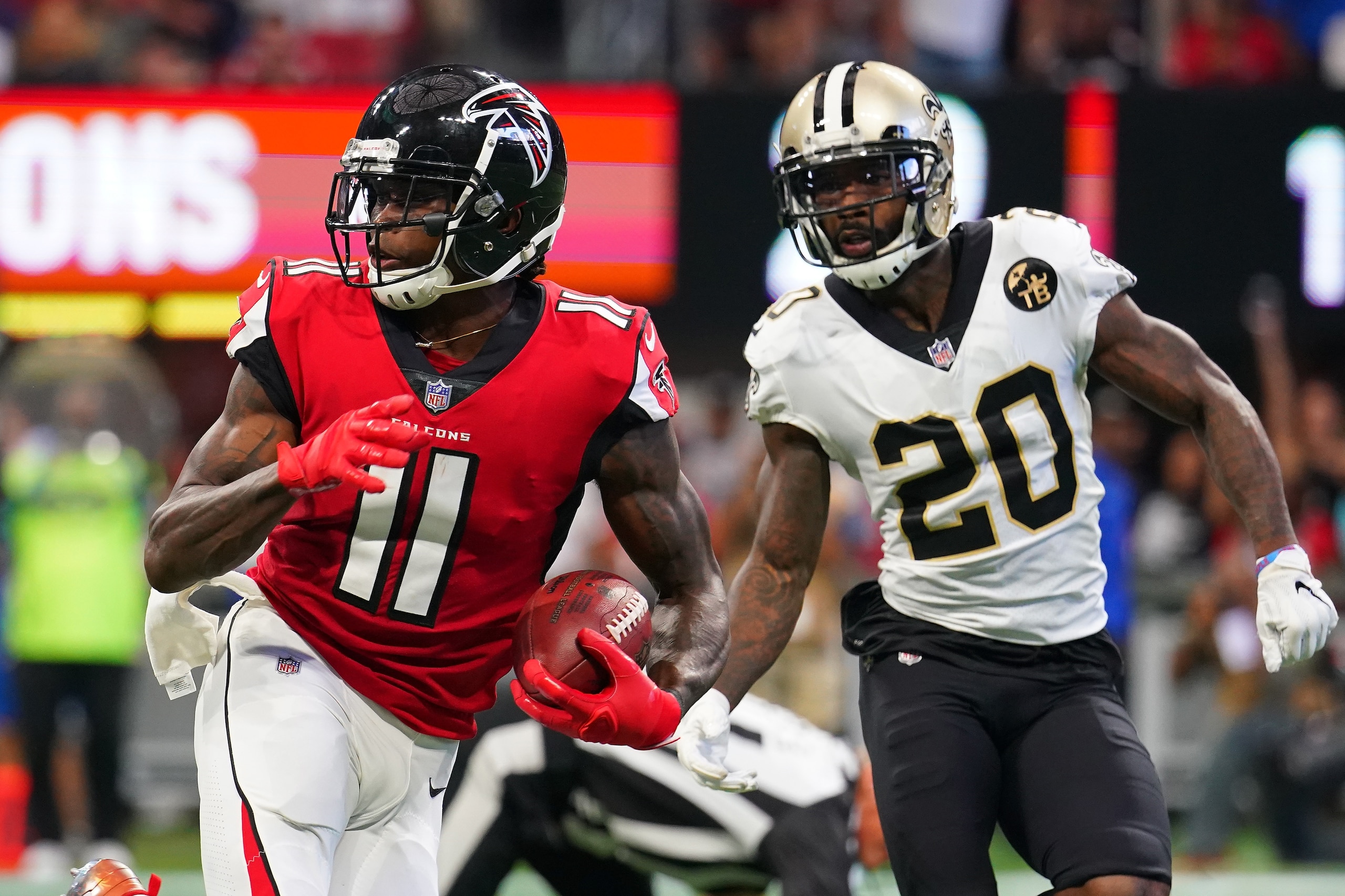 Saints cornerback Ken Crawley trailing Falcons wideout Julio Jones in coverage