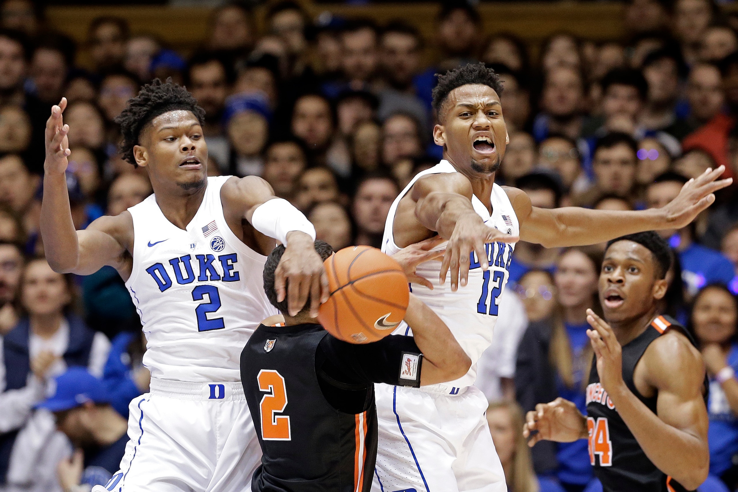 Duke's Cam Reddish (2) and Javin DeLaurier (12)