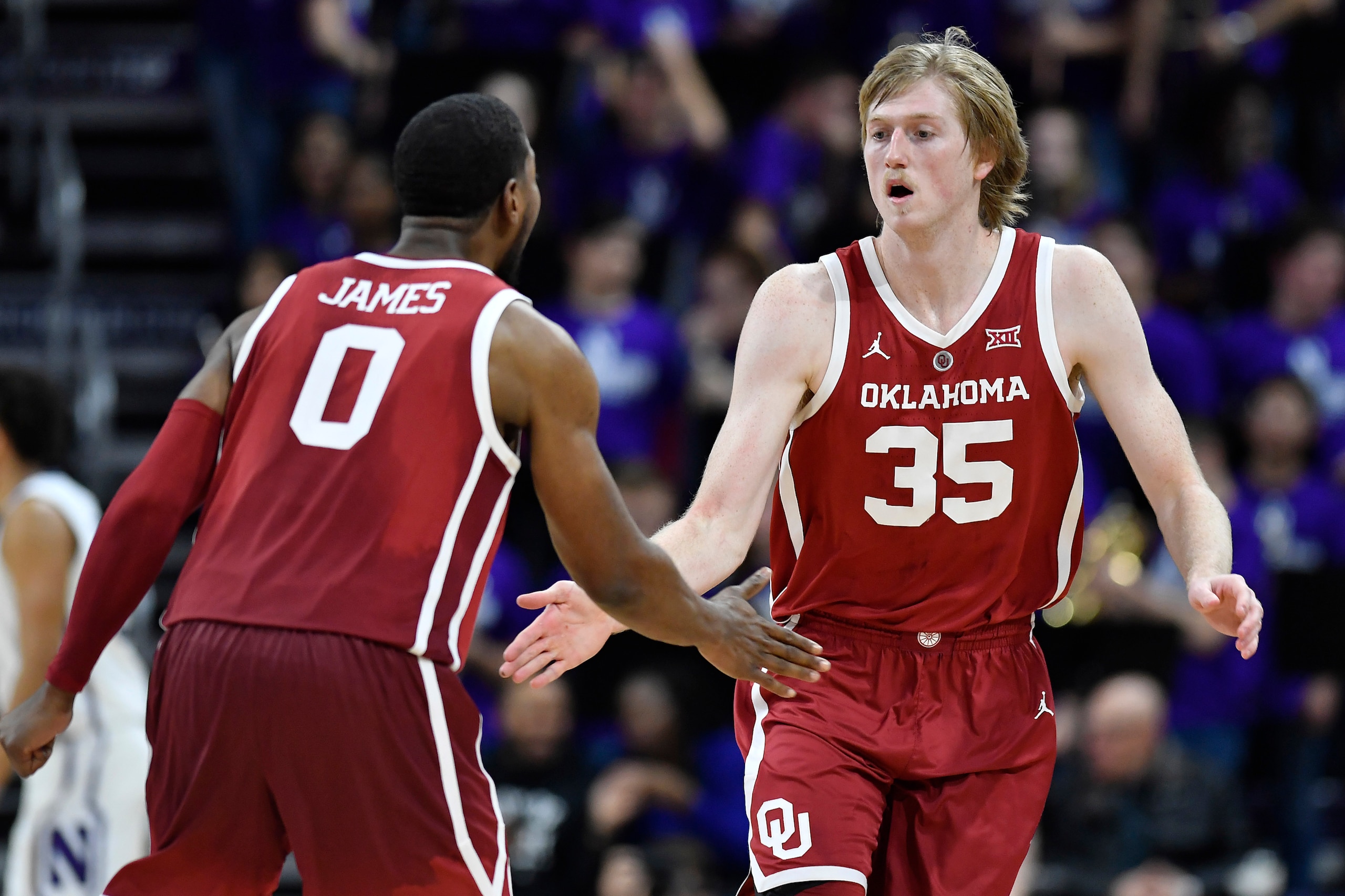 Oklahoma's Christian James and Brady Manek