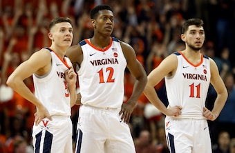 Kyle Guy (5), De'Andre Hunter (12) and Ty Jerome (11)