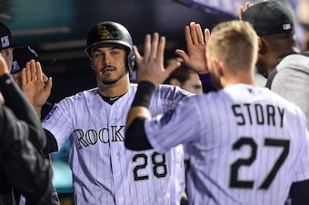 Nolan Arenado (L) and Trevor Story (R)