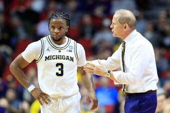 Zavier Simpson and John Beilein