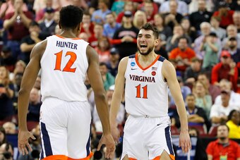 De'Andre Hunter (12) and Ty Jerome (11)