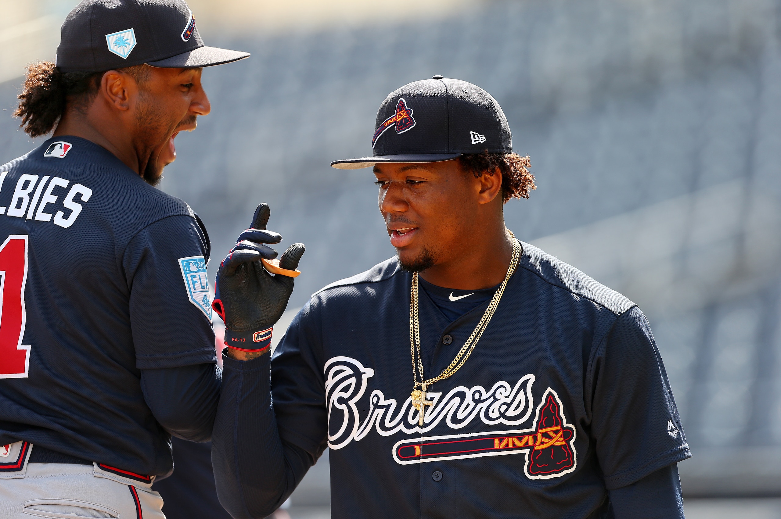 Ozzie Albies (L) and Ronald Acuna Jr. (R)
