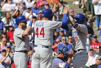 Mark Zagunis (L), Anthony Rizzo (C) and Javier Baez (R)