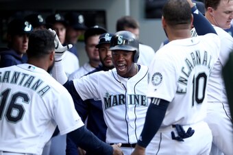 Domingo Santana (L), Tim Beckham (C) and Edwin Encarnacion (R)