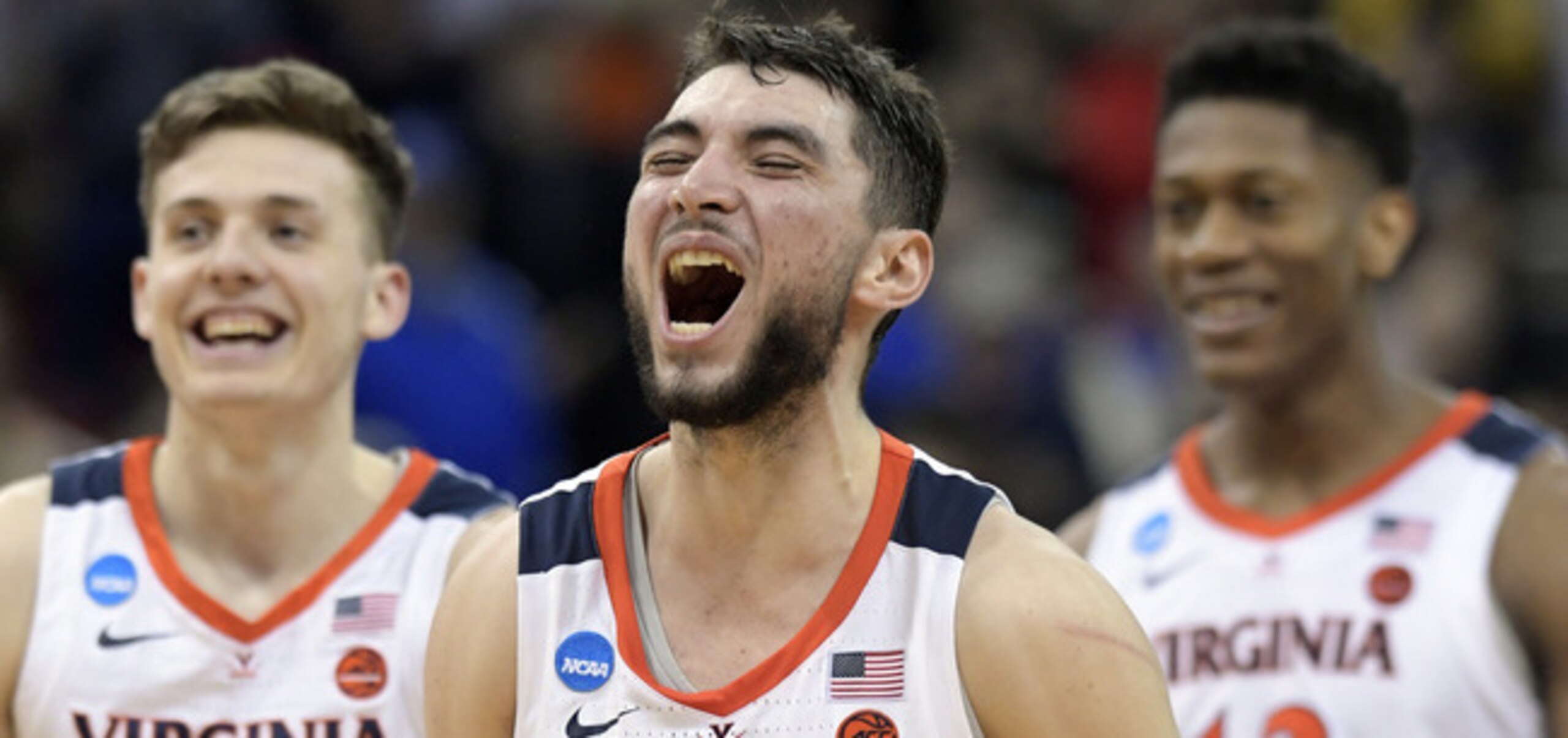 Ty Jerome (11), Kyle Guy (5), and De'Andre Hunter (12)