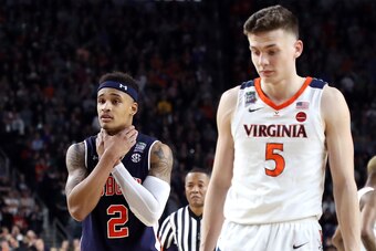 Kyle Guy (5) and Bryce Brown (2)
