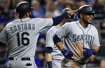 Domingo Santana (L) and Edwin Encarnacion (R)