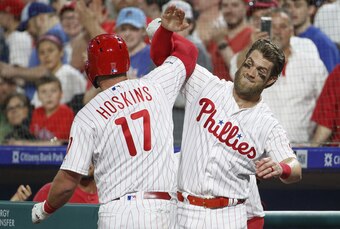 Rhys Hoskins (L) and Bryce Harper (R)