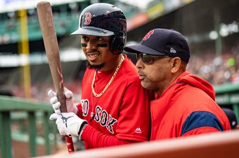 Mookie Betts (L) and Alex Cora (R)