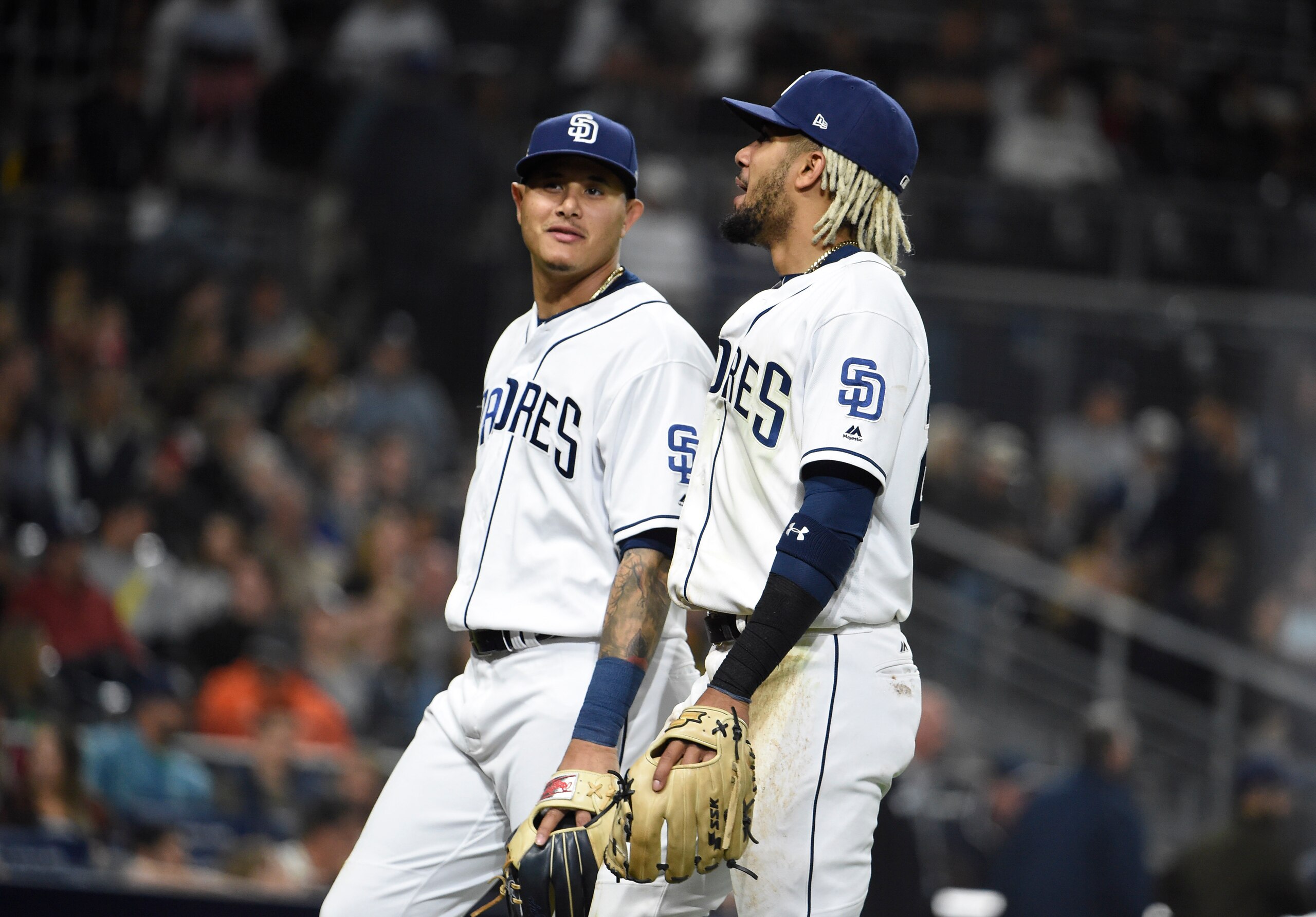 Manny Machado (L) and Fernando Tatis Jr. (R)