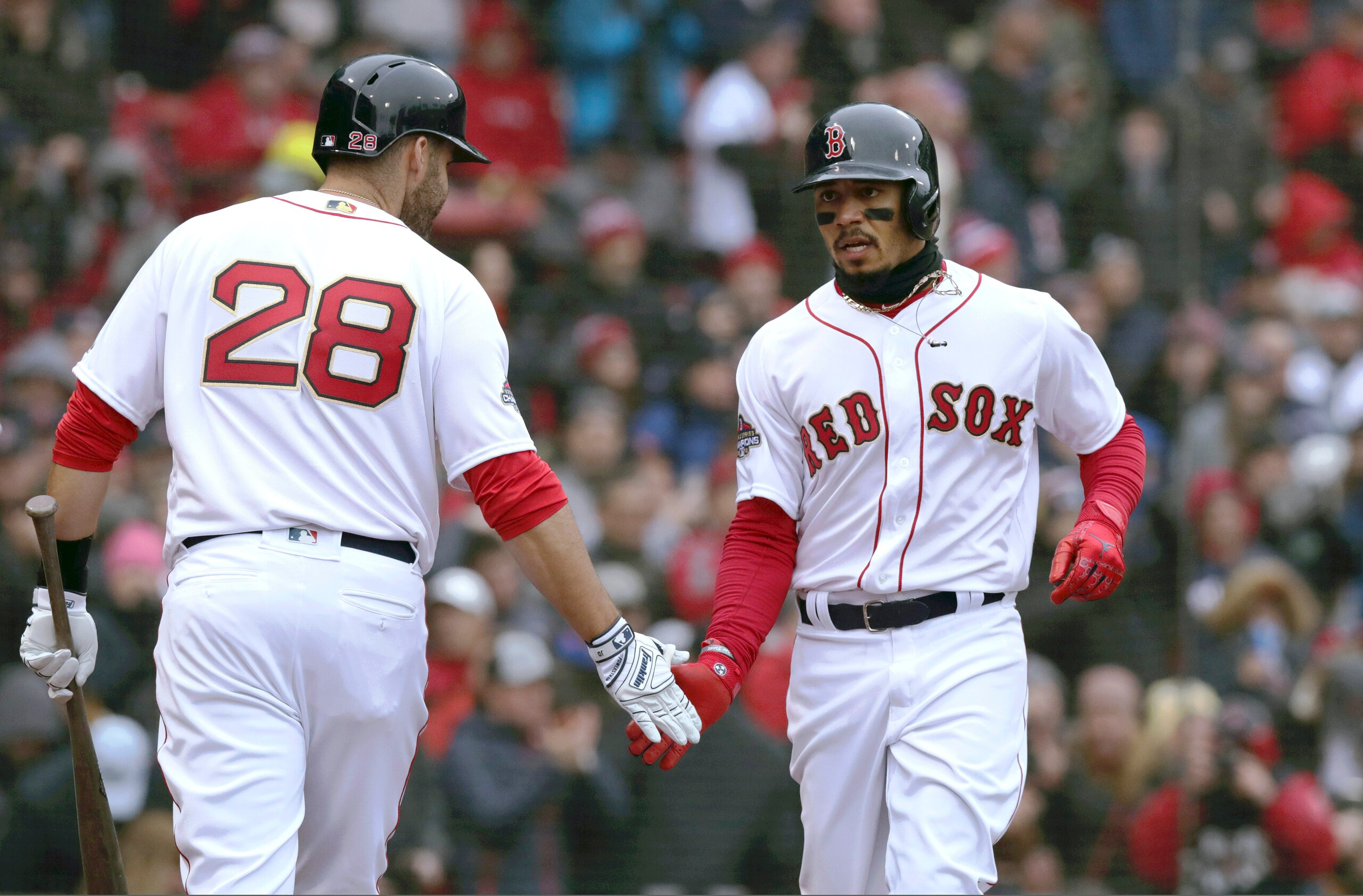 J.D. Martinez (L) and Mookie Betts (R)