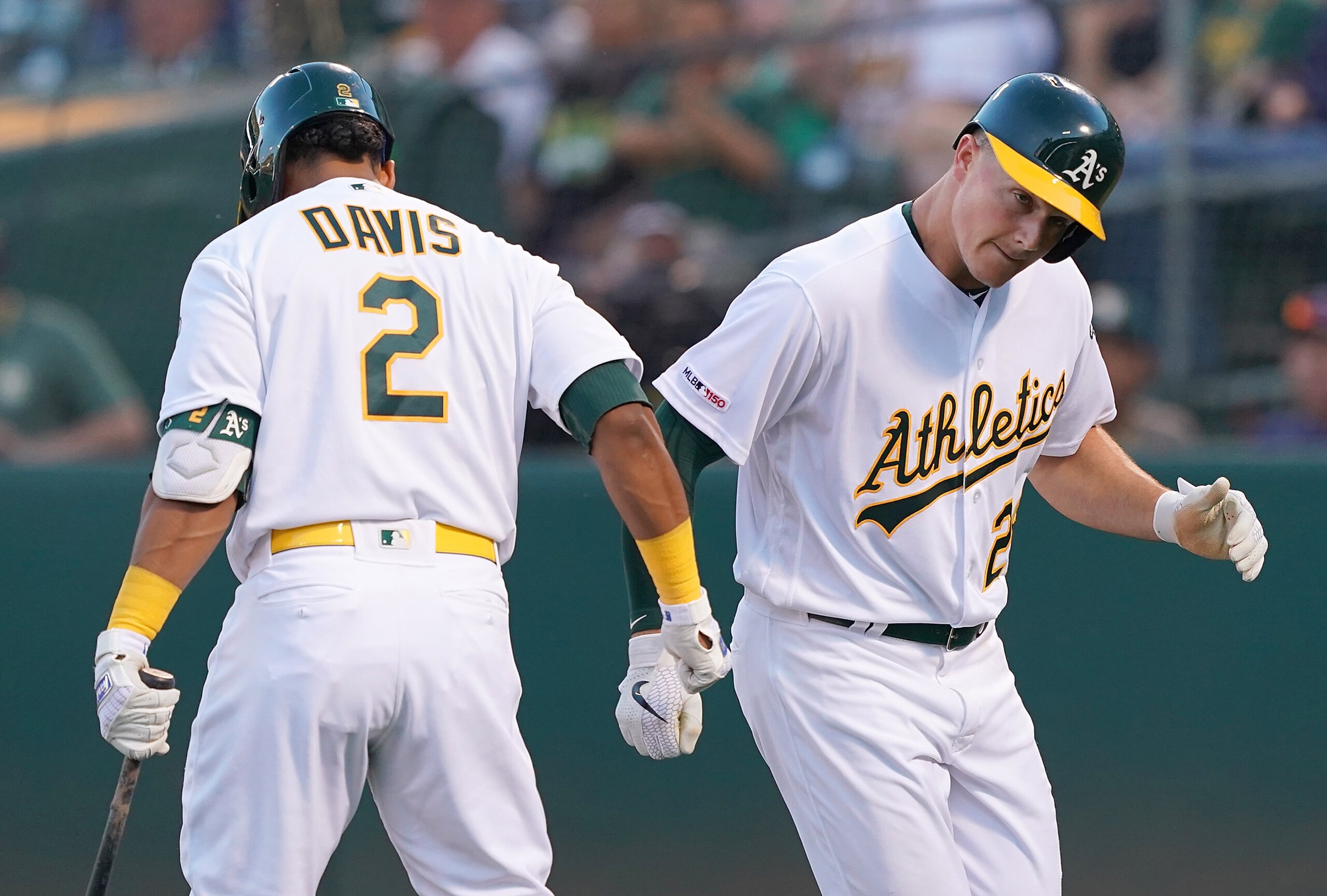 Khris Davis (L) and Matt Chapman (R)