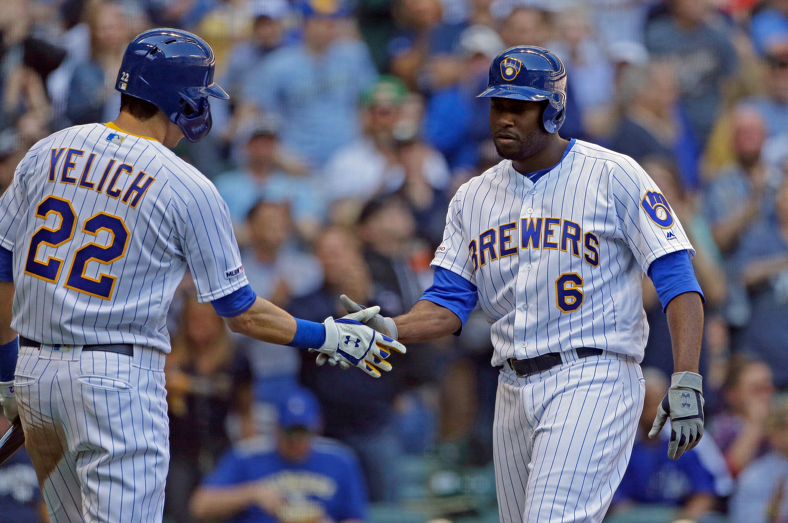 Christian Yelich (L) and Lorenzo Cain (R)
