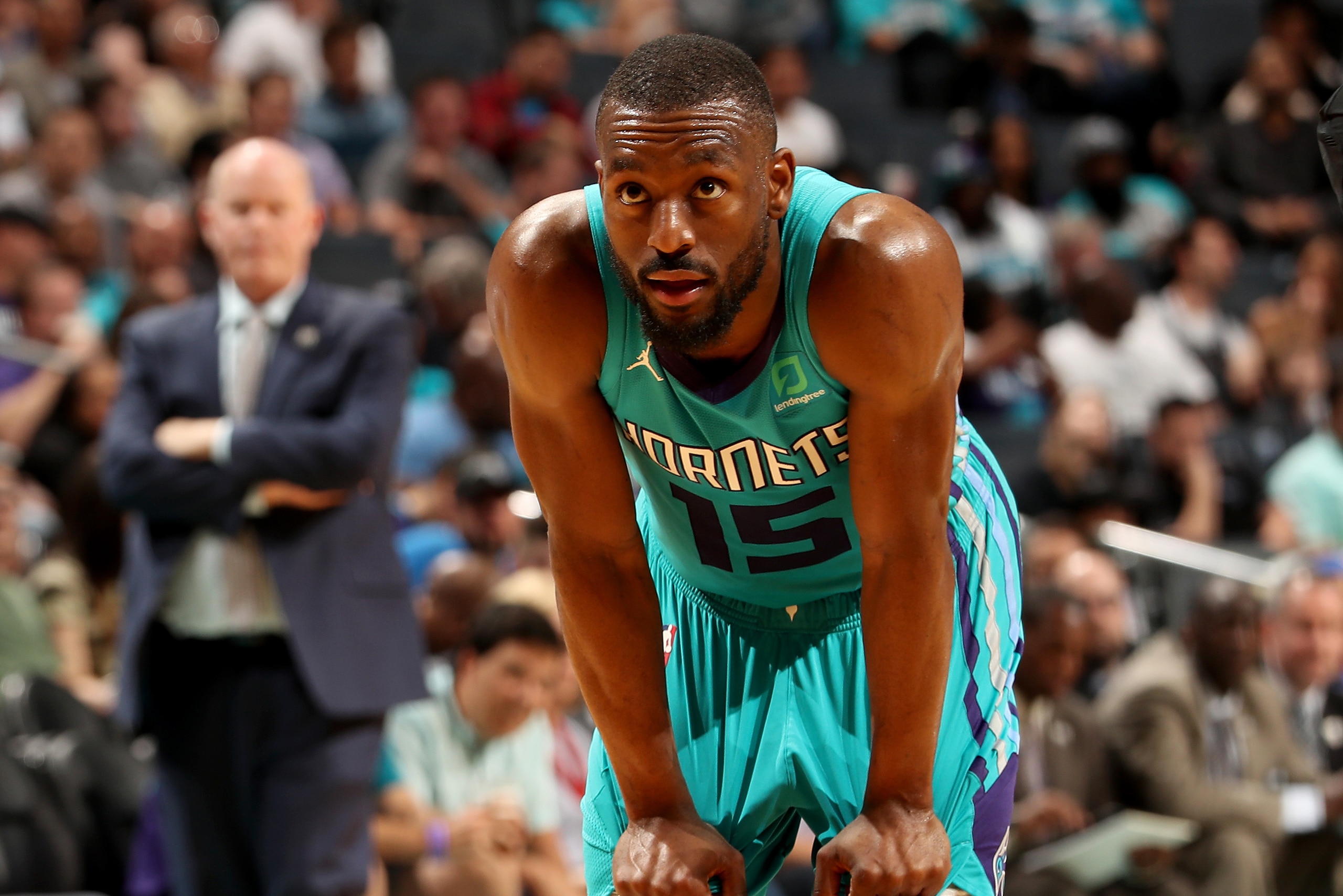 CHARLOTTE, NC - APRIL 10: Kemba Walker #15 of the Charlotte Hornets looks on during the game against the Orlando Magic on April 10, 2019 at Spectrum Center in Charlotte, North Carolina. NOTE TO USER: User expressly acknowledges and agrees that, by downloa