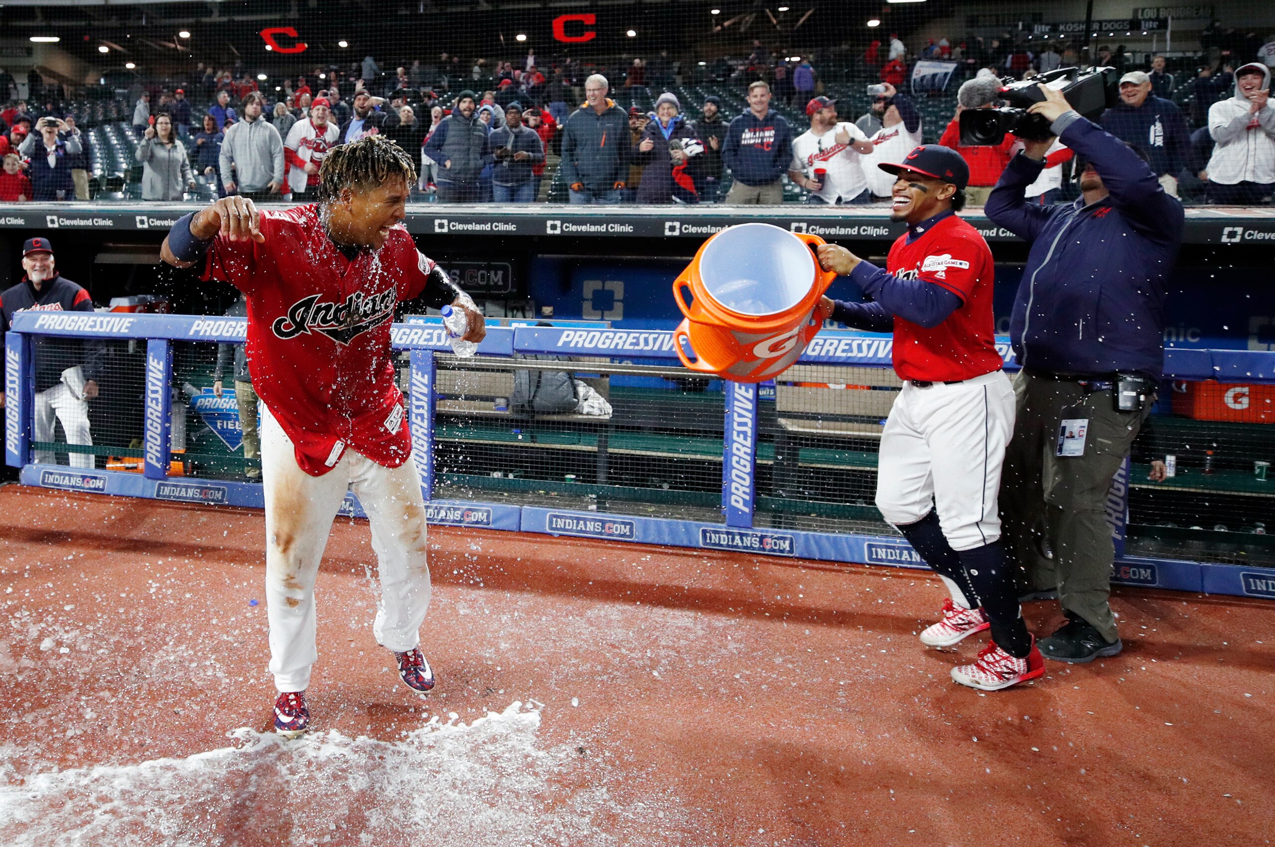 Jose Ramirez (L) and Francisco Lindor (R)