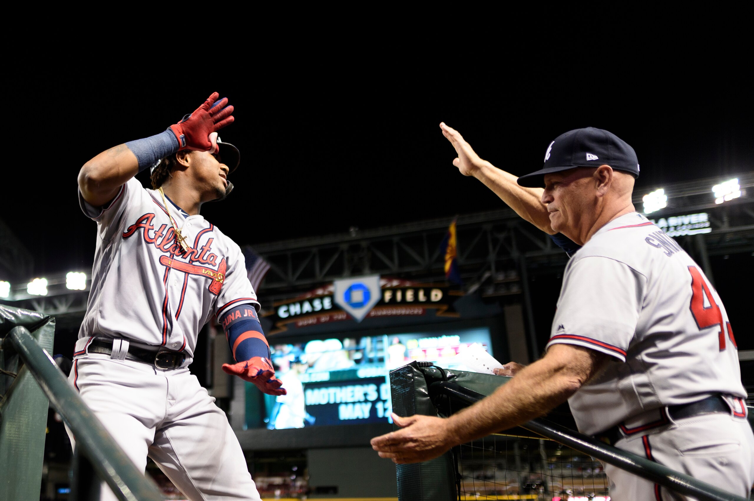 Ronald Acuna Jr. (L) and Brian Snitker (R) Ronald Acuna Jr. (L) and Brian Snitker (R)