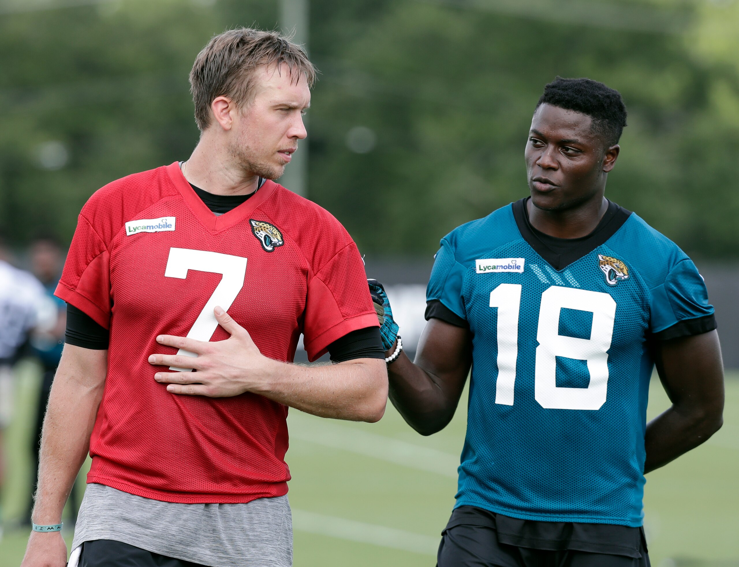 Jacksonville Jaguars quarterback Nick Foles and wideout Chris Conley