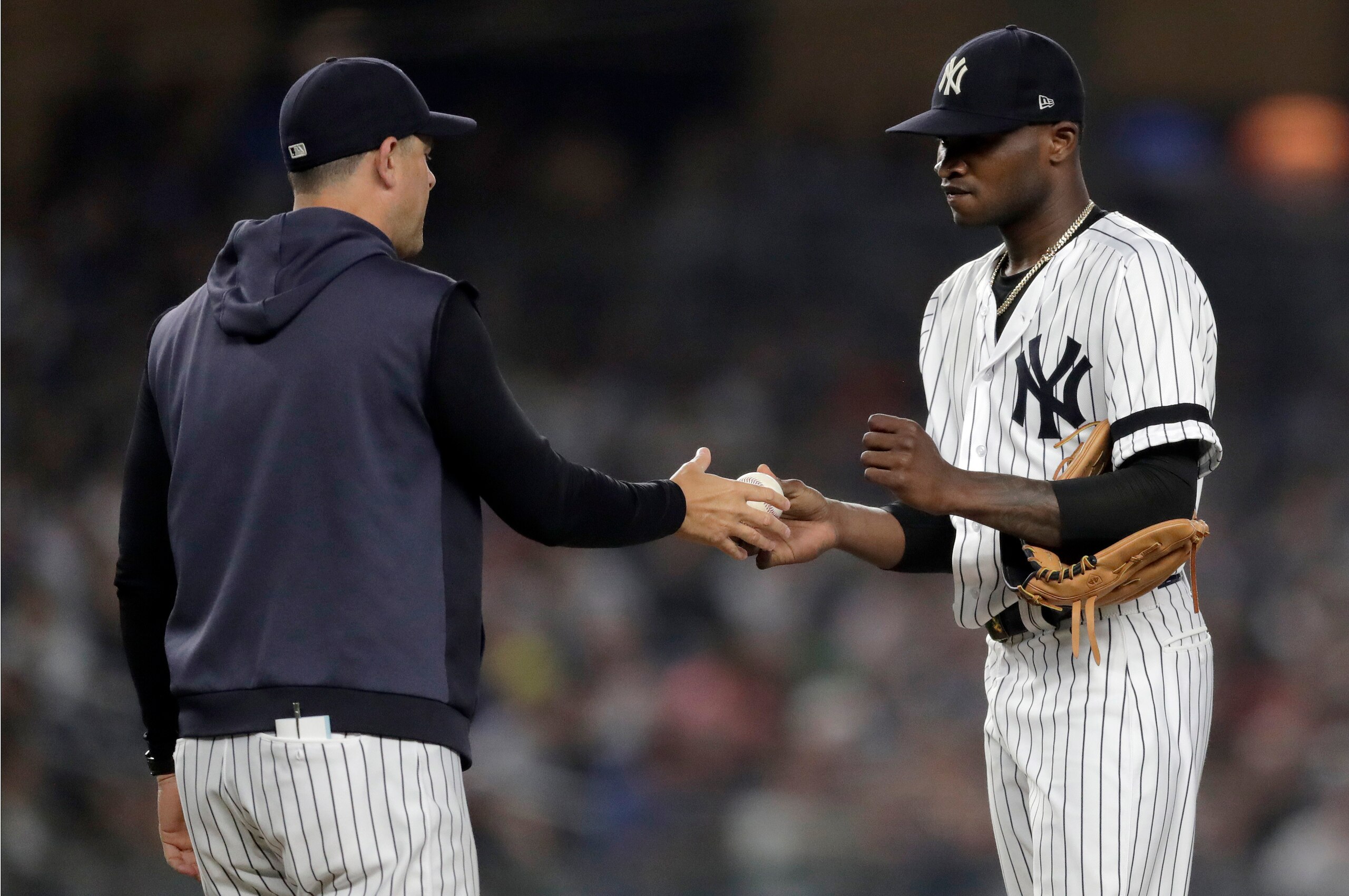 Aaron Boone (L) and Domingo German (R)
