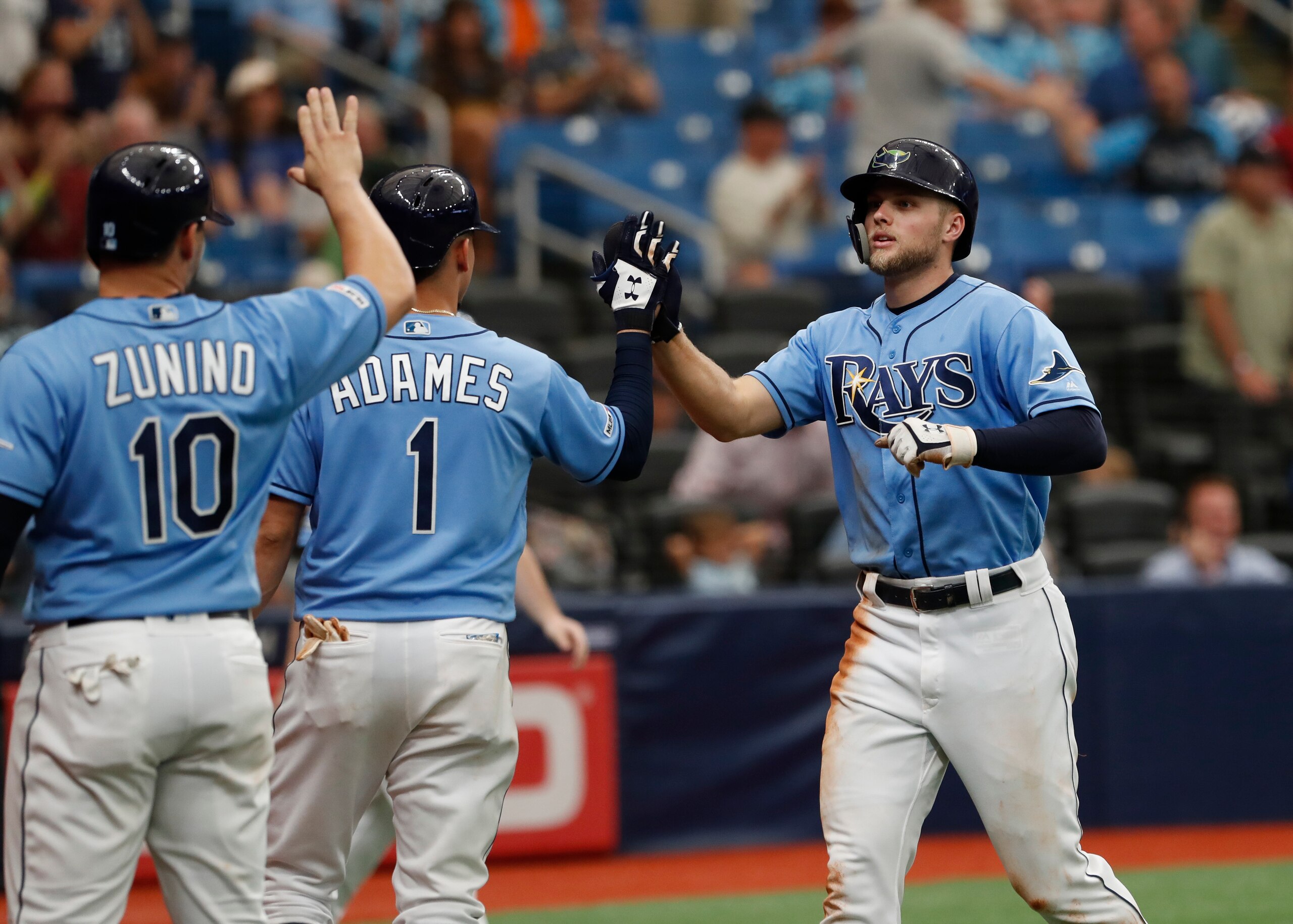 Mike Zunino (L), Willy Adames (C) and Austin Meadows (R)