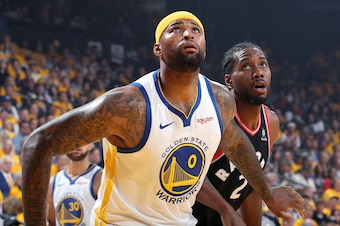 OAKLAND, CA - JUNE 5: DeMarcus Cousins #0 of the Golden State Warriors boxes out Kawhi Leonard #2 of the Toronto Raptors during Game Three of the NBA Finals on June 5, 2019 at ORACLE Arena in Oakland, California. NOTE TO USER: User expressly acknowledges 