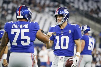 Jon Halapio and Eli Manning