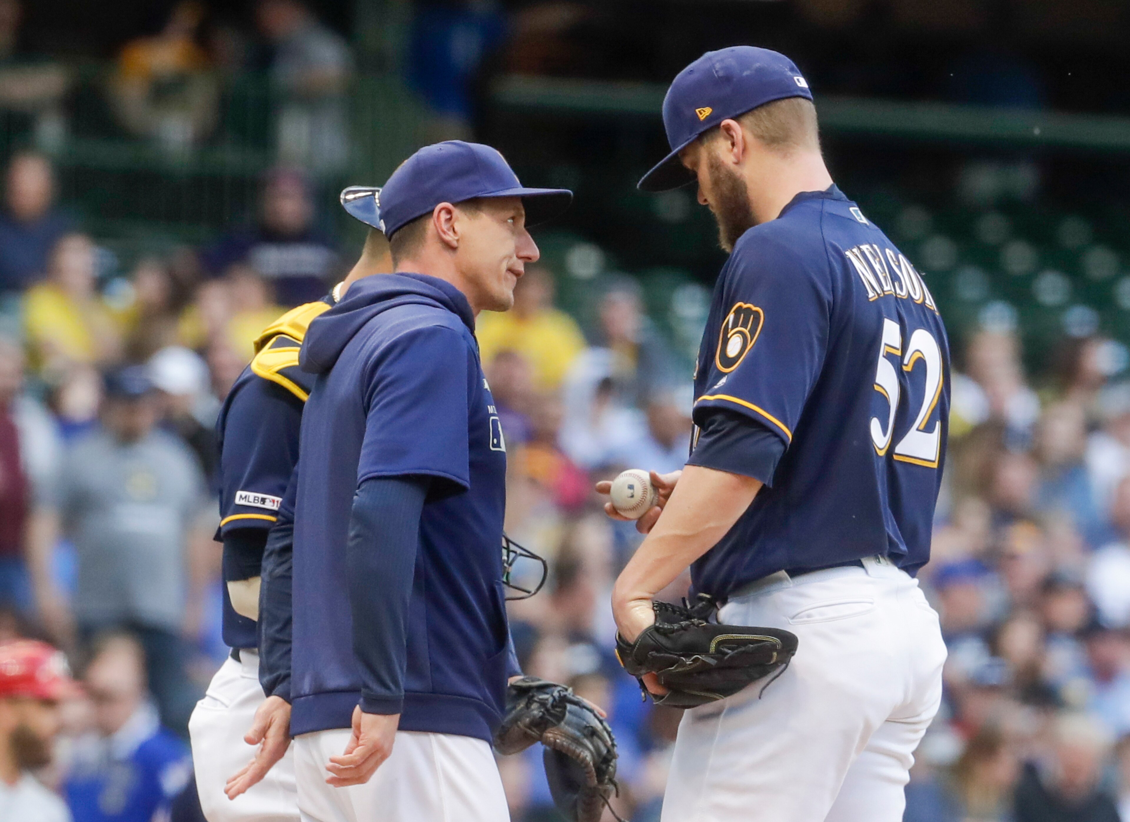 Craig Counsell (L) and Jimmy Nelson (R) Craig Counsell (L) and Jimmy Nelson (R)