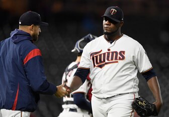 Rocco Baldelli (L) and Michael Pineda (R)