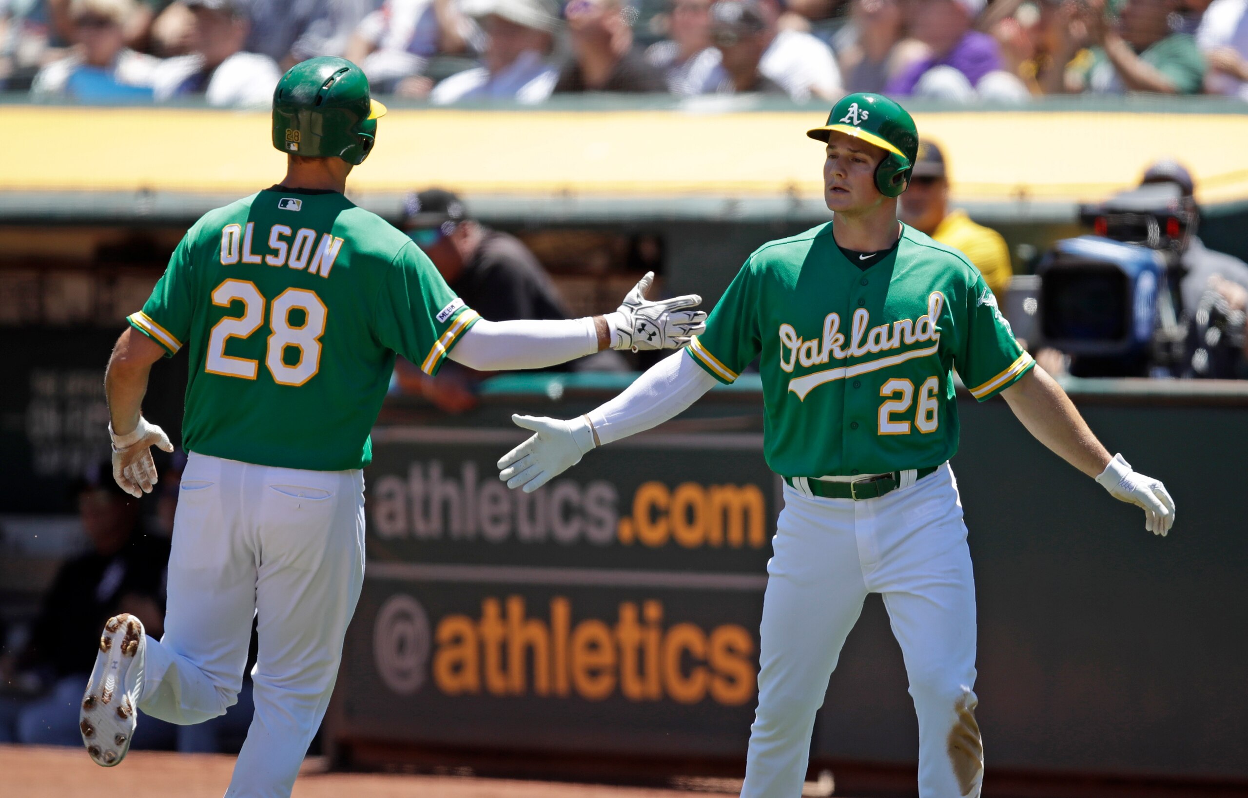 Matt Olson (L) and Matt Chapman (R)