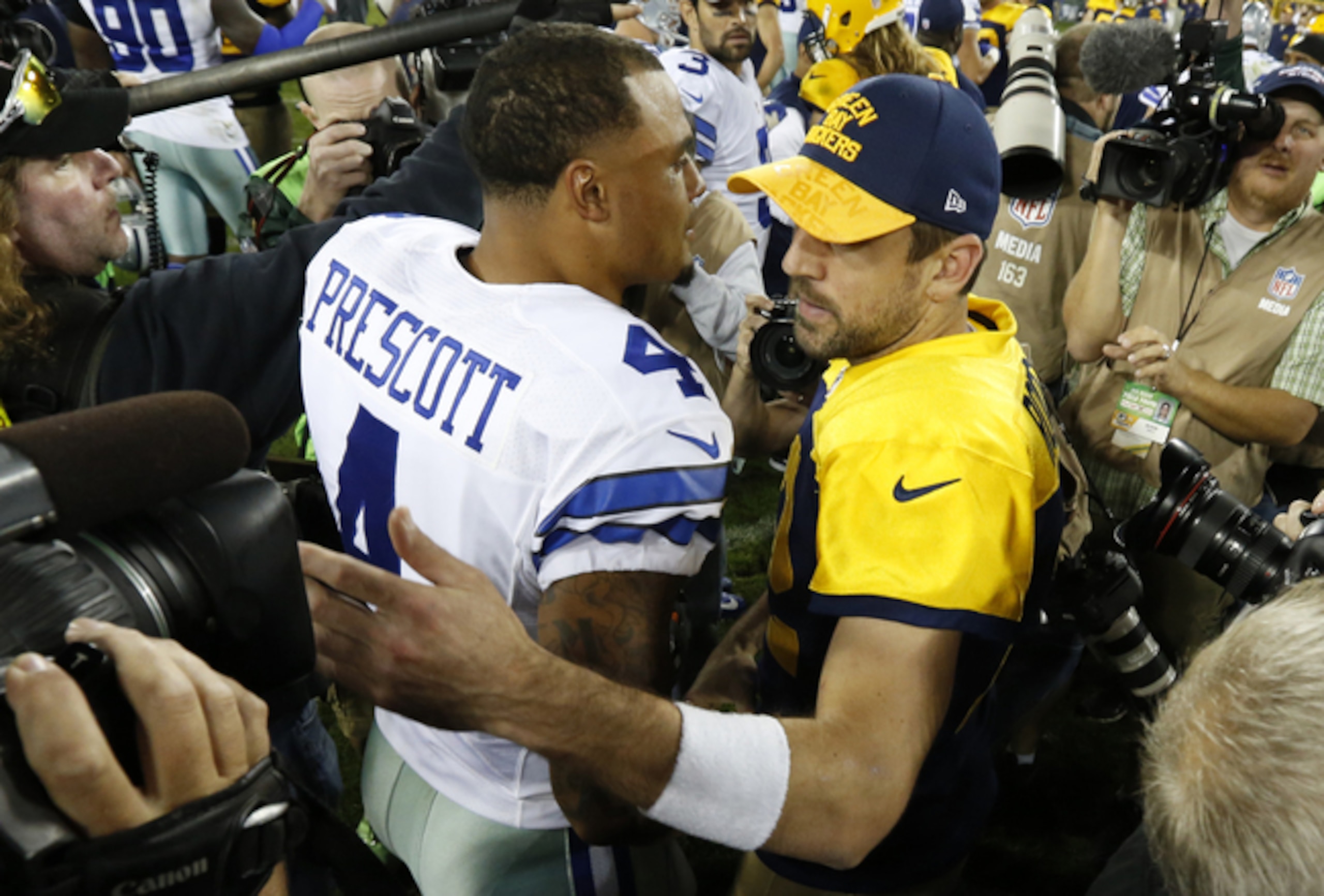 Dallas Cowboys quarterback Dak Prescott (left) and Green Bay Packers quarterback Aaron Rodgers (right) Dallas Cowboys quarterback Dak Prescott (left) and Green Bay Packers quarterback Aaron Rodgers (right)