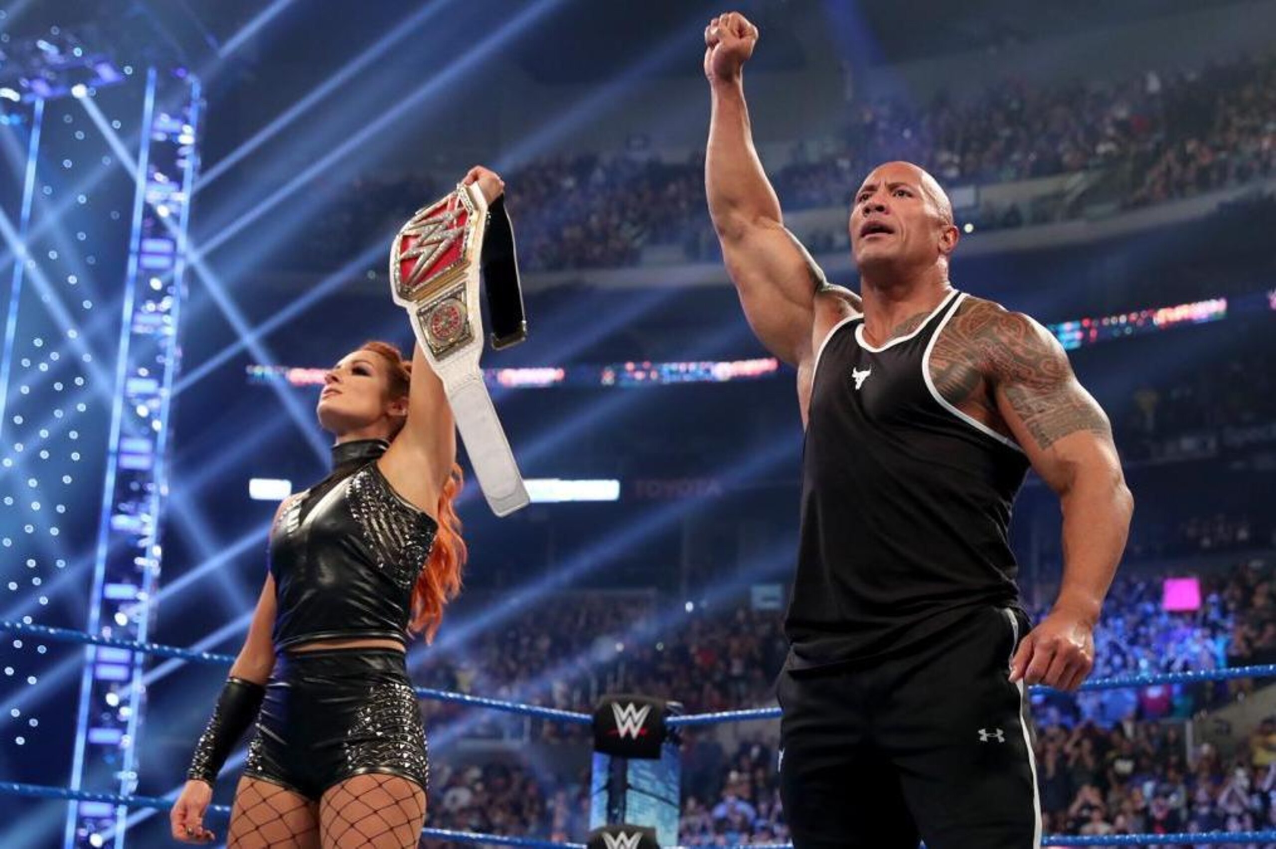 Becky Lynch and The Rock on SmackDown. Becky Lynch and The Rock on SmackDown.