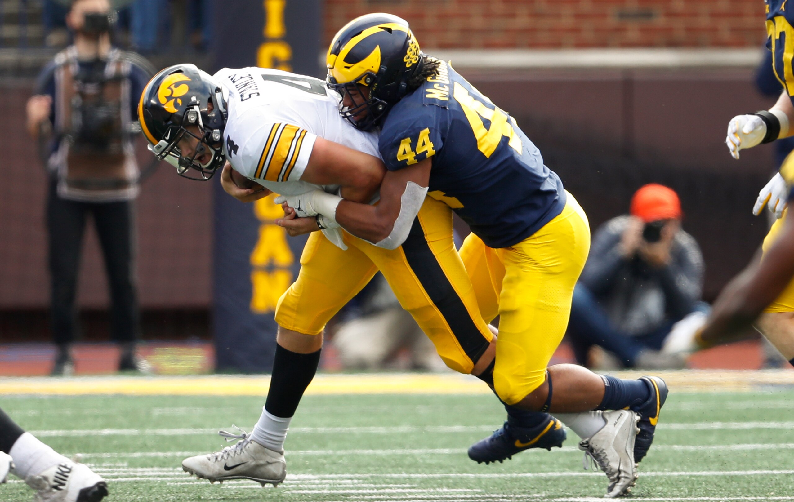 Cameron McGrone (44) brings down Nate Stanley