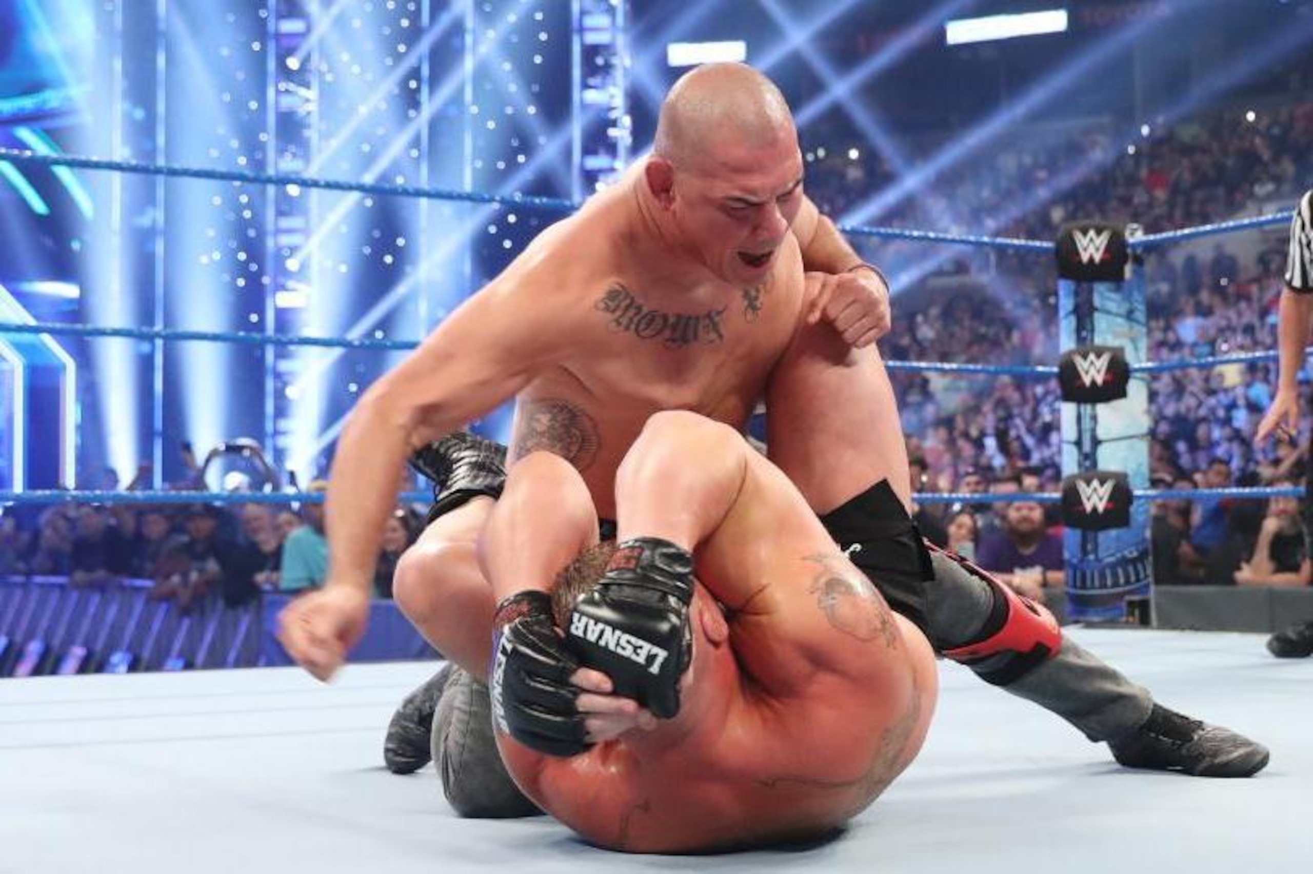 Cain lays the smack down on Lesnar.