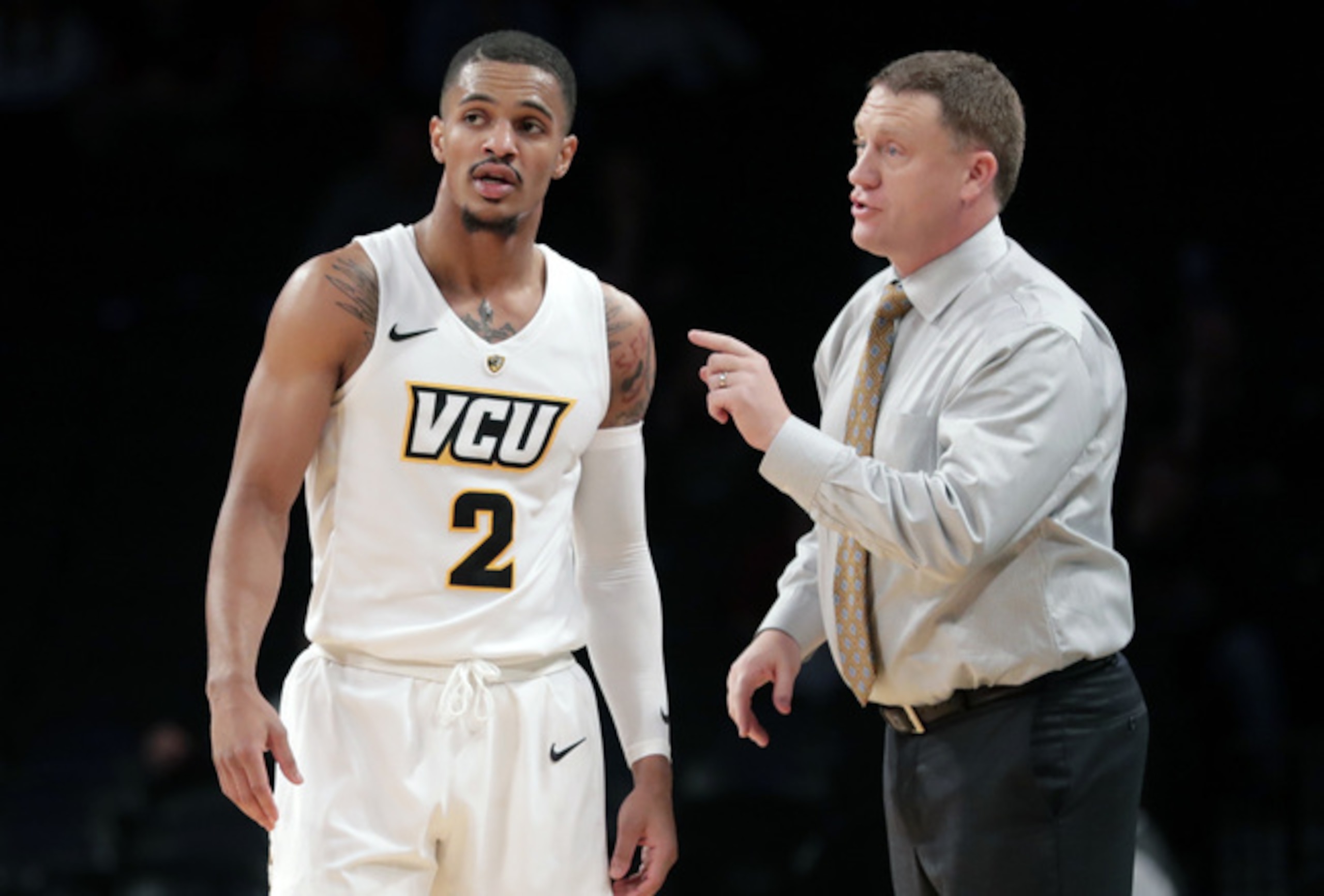 Marcus Evans (2) and Mike Rhoades