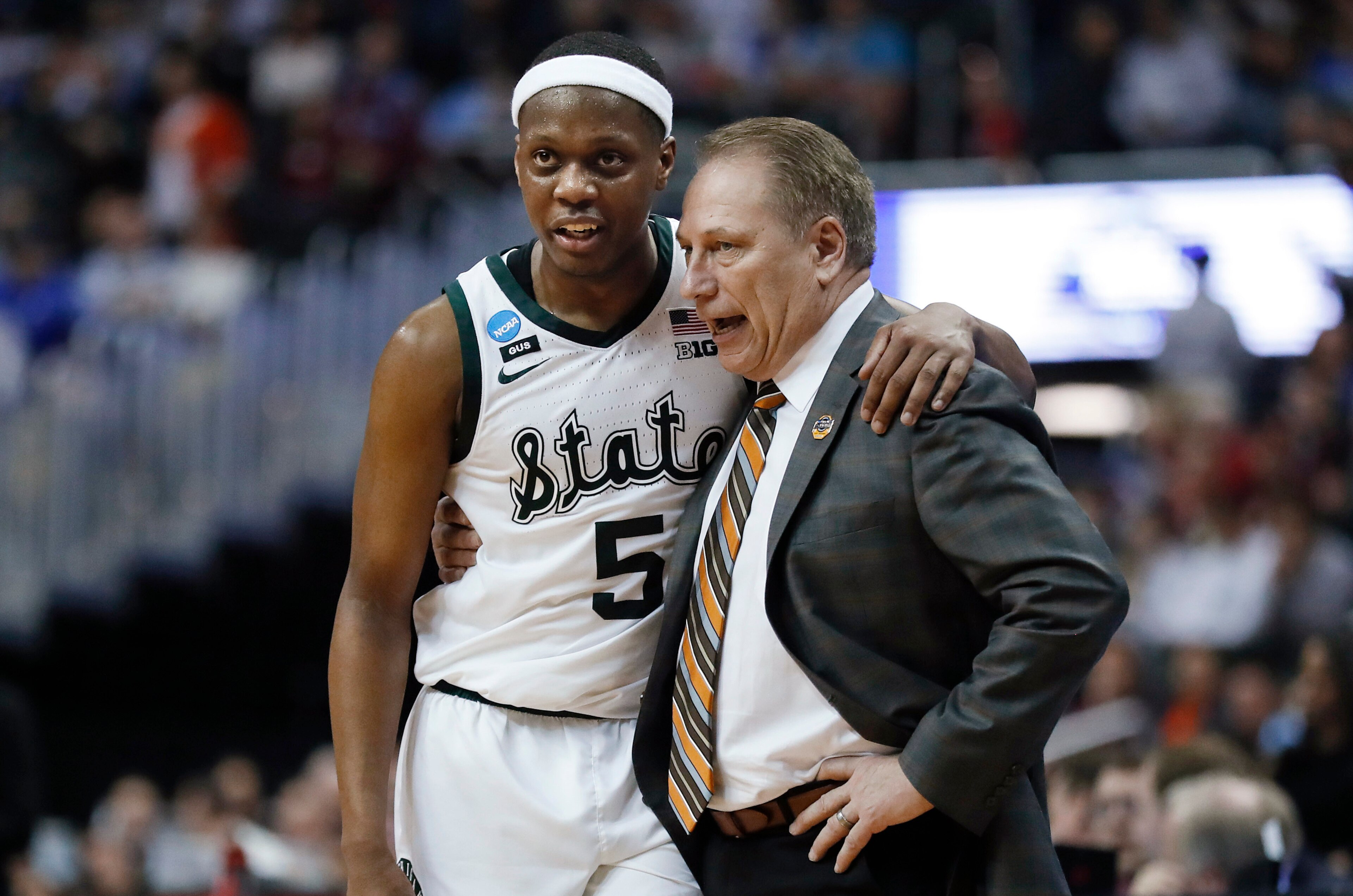 Michigan State's Cassius Winston and Tom Izzo