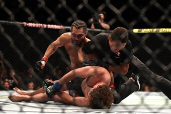 Askren (lying down) after record-breaking KO loss to Jorge Masvidal