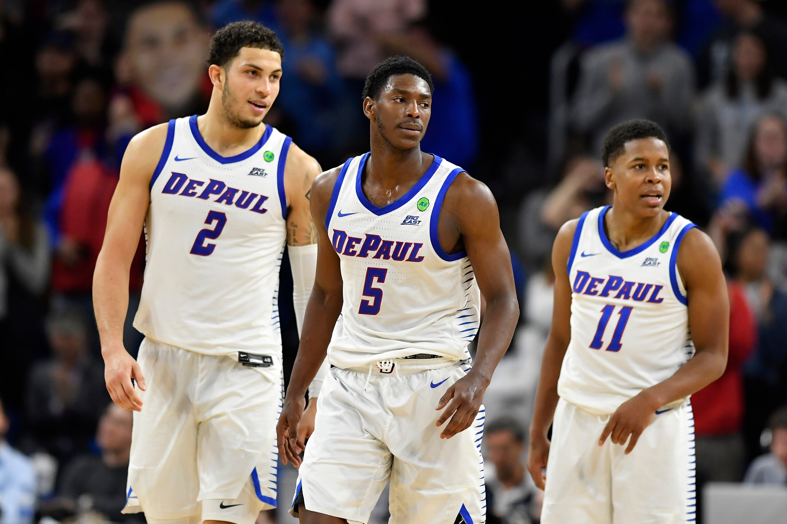 DePaul's Jaylen Butz (2), Jalen Coleman-Lands (5) and Charlie Moore (11)