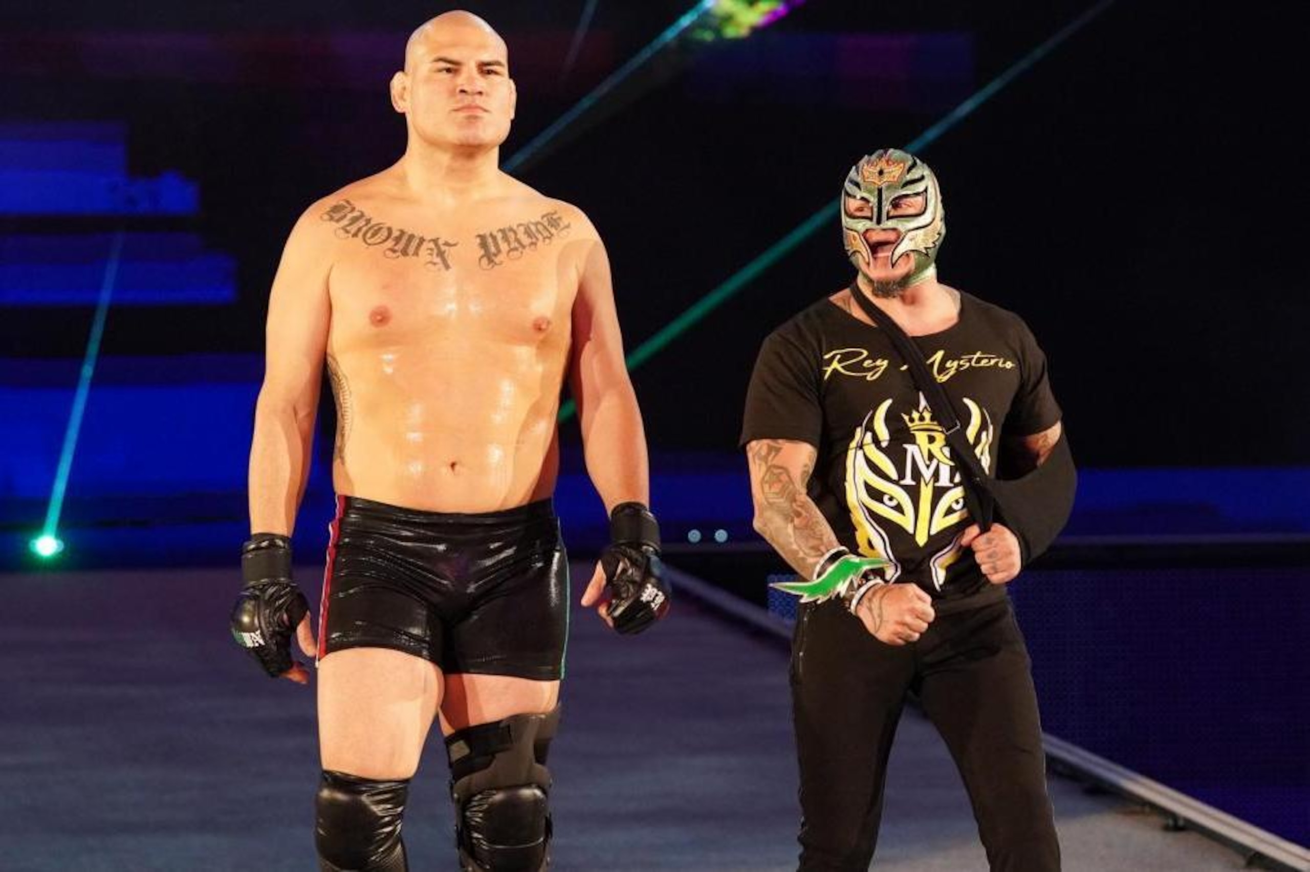 Cain Velazquez and Rey Mysterio.