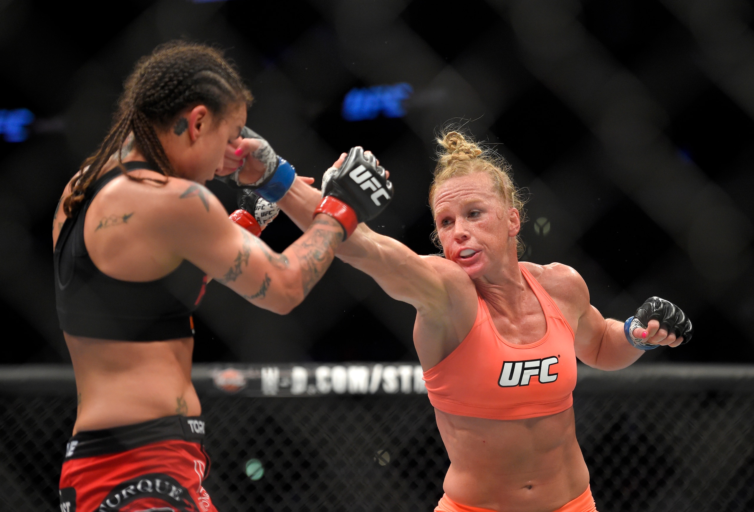 Holly Holm defeated Raquel Pennington in her UFC debut at UFC 184. Holly Holm defeated Raquel Pennington in her UFC debut at UFC 184.
