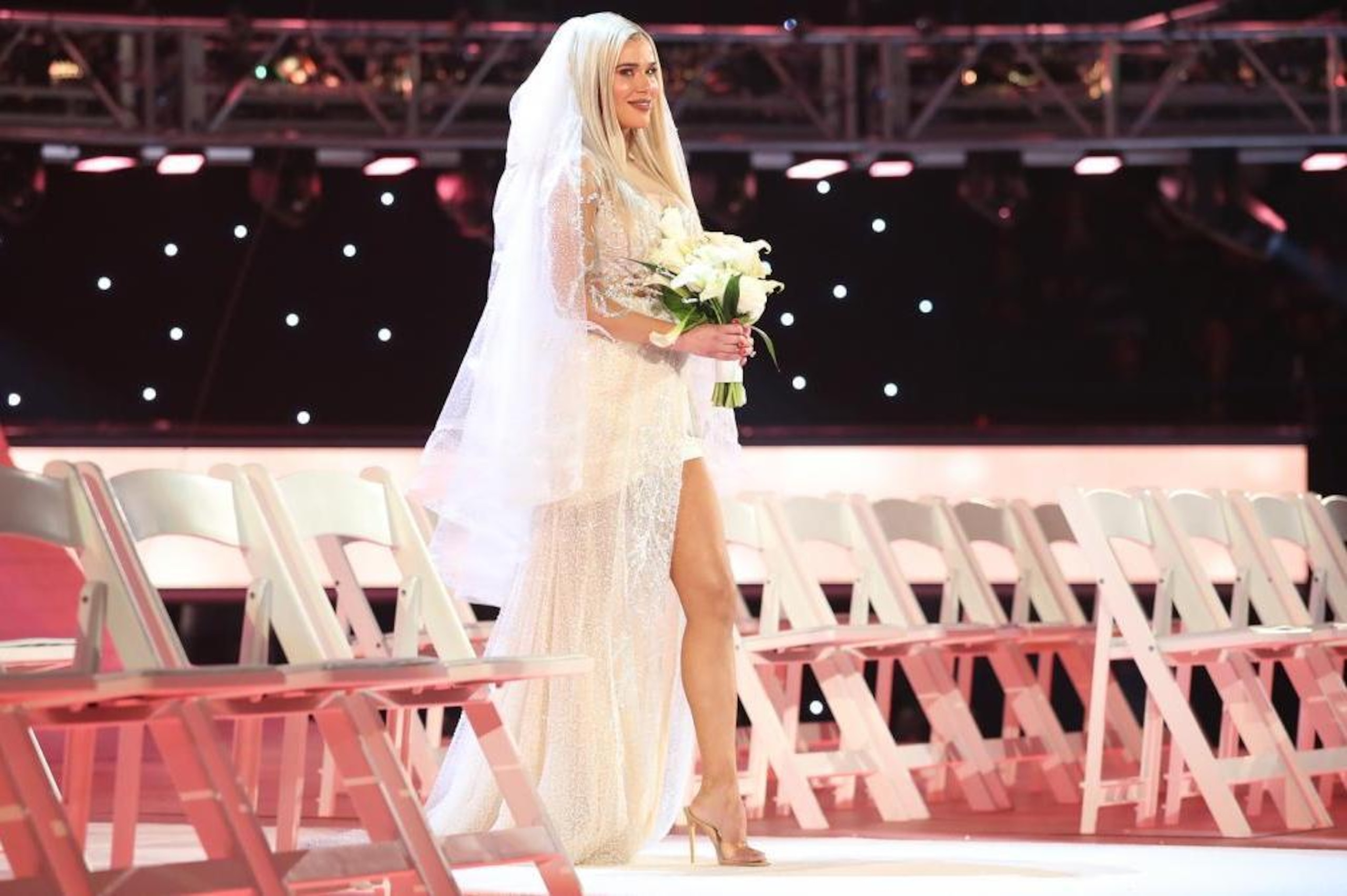 Lana walking down the aisle.