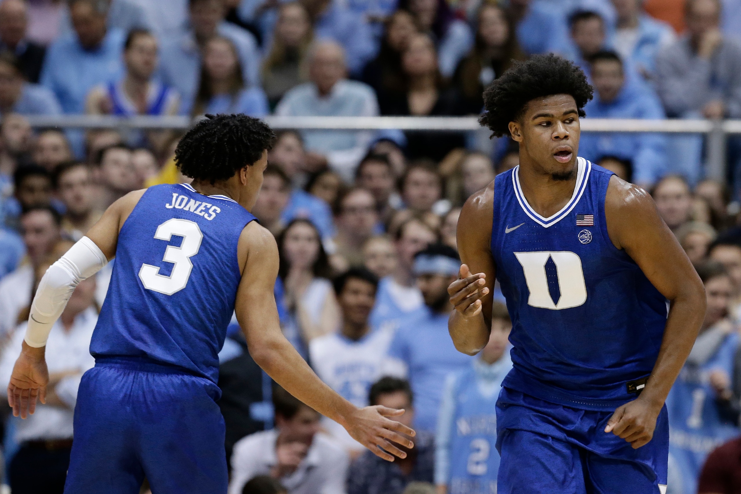Tre Jones and Vernon Carey Jr.