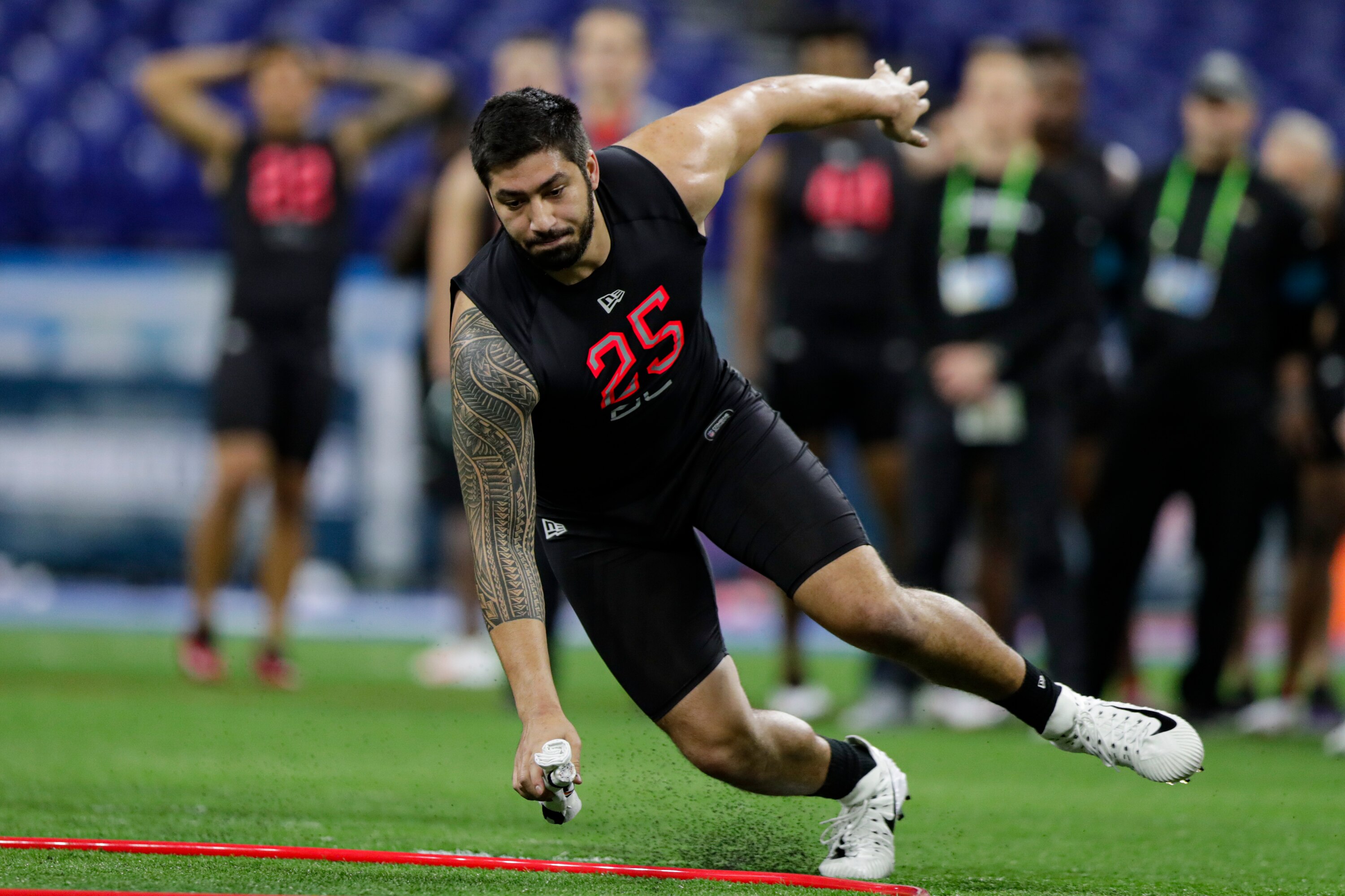 NFL Scouting Combine Notebook: Did A.J. Epenesa Crater His Draft Stock?