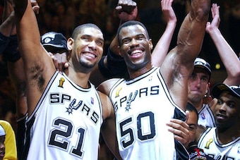 Tim Duncan (21) and David Robinson (50)